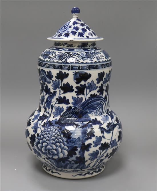 A Chinese blue and white jar and cover, Kangxi mark but late 19th century height 37cm